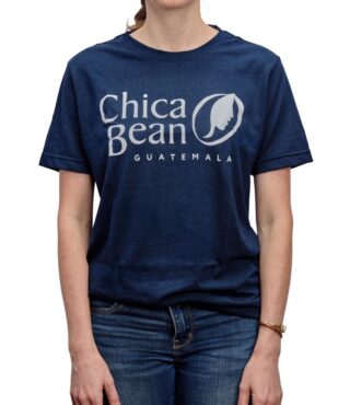 A Navy Blue, unisex crew-neck t-shirt on a female model that has the Chica Bean logo printed in white on the chest.